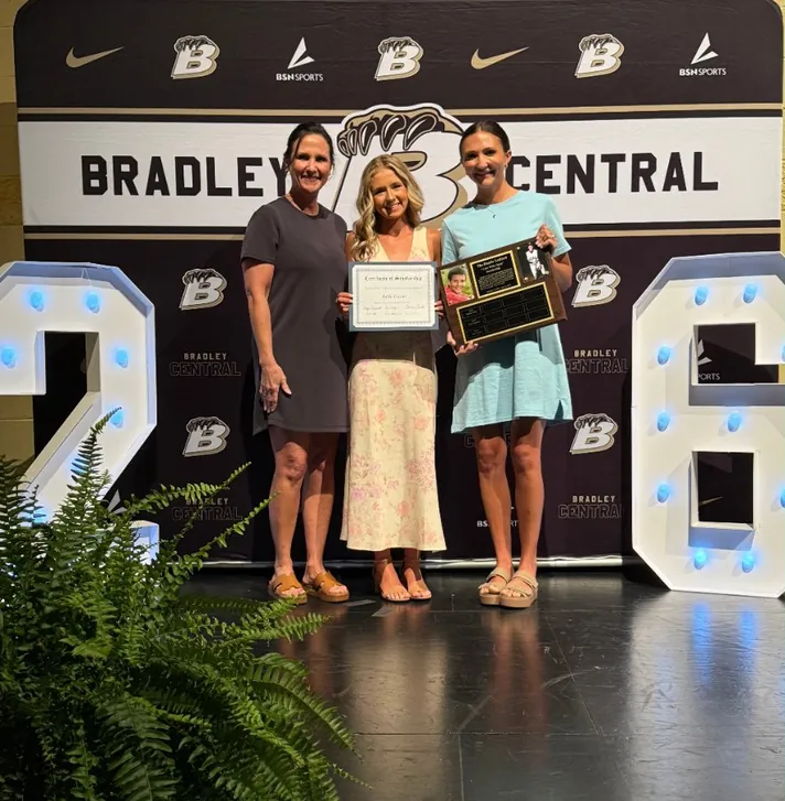 Addie Frazier receiving the 2026 Live Wide Open scholarship at Bradley Central High School